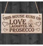 WOODEN PLAQUE - 200x100 - House Runs On Prosecco